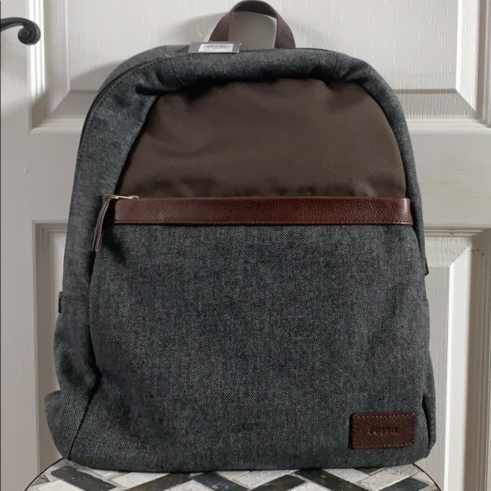 Fossil “Travis” travel backpack.